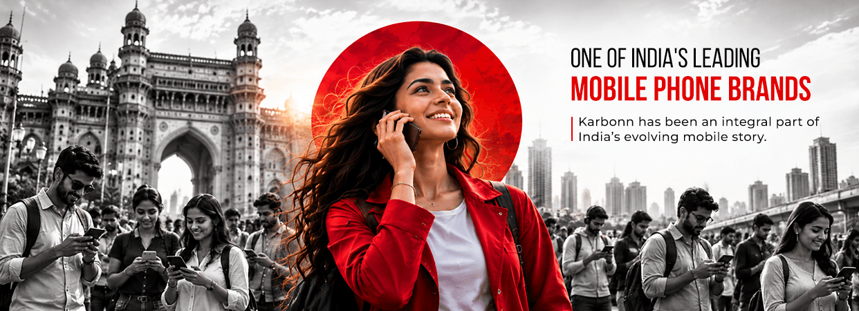 One of India’s leading mobile phone brands. Karbonn has been an integral part of India’s evolving mobile story. A woman in a red jacket on a call in front of the Gateway of India.