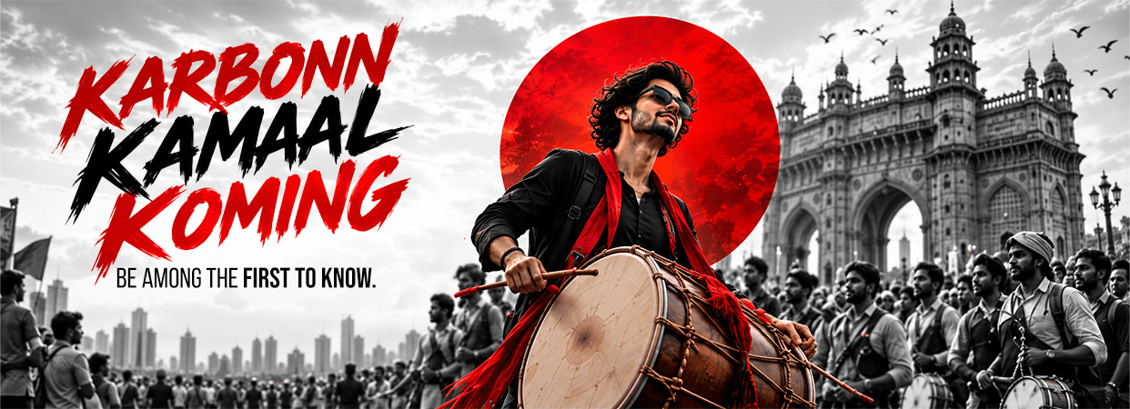 Karbonn Kamaal Koming — be among the first to know. A drummer playing a dhol in a festive crowd in front of the Gateway of India.
